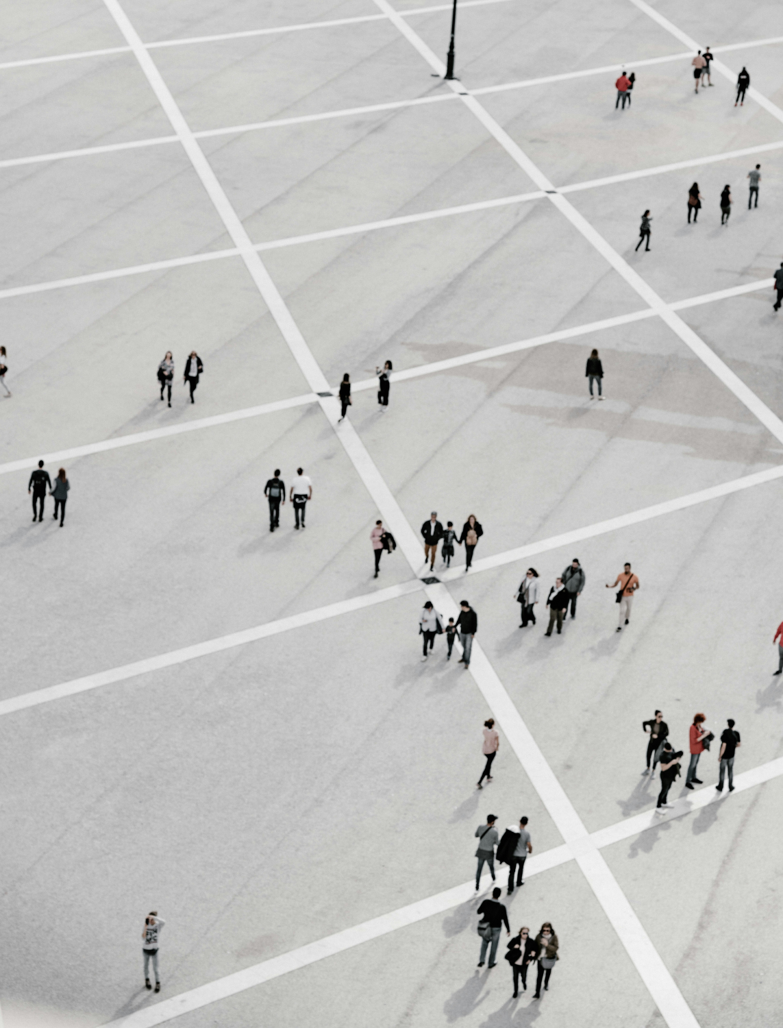 People moving across a public plaza